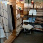 arafed display of towels and blankets in a store