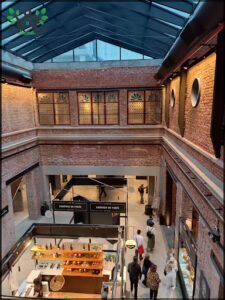 arafed view of a large building with a lot of people