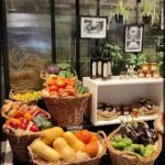there are many baskets of food on the counter in the restaurant