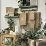 there are many plants and other items on display in a store