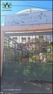 there is a sign that says forage and a building behind it