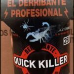 a close up of a bottle of liquid with a sticker on it