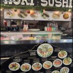 A sushi restaurant menu with various sushi options.