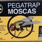 there is a box of mosquito repellent sitting on the ground
