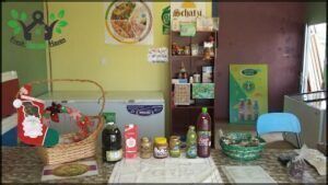 there is a table with a basket of food and a basket of condiments