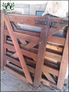 there is a wooden crate with a stuffed animal on top of it