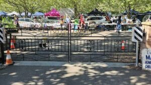 A black iron gate with the numbers 1905 on it.