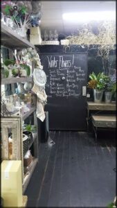A blackboard with a list of winter flowers on it.
