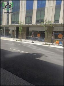 A city street with a cafe and a restaurant.