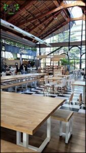 A large restaurant with a variety of tables and chairs.