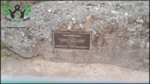 A plaque on a rock commemorating the senses walk.