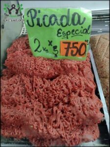 A sign for a special sale of meat.