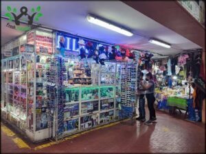 A store with a large display of sunglasses.