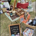 A table full of vintage items and collectibles.