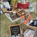 A table full of vintage items and collectibles.