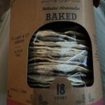 A box of baked tortillas sits on a table.