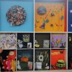 A display of various items, including a teddy bear, a pumpkin, and a book, is arranged in a visually appealing manner.