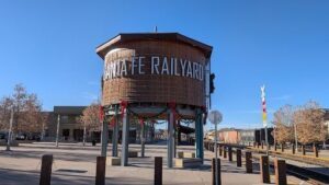 A large wooden structure with the words Santa Fe Railway on it.