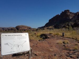 A sign on a rocky hillside tells the story of Guaranding.