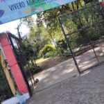 A sign welcoming visitors to a garden.