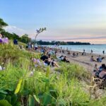 Crowds on the beach prior to sunset!