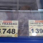 A display of food items, including trashes and tittas de pepino, is shown in a store.