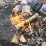 A fire is burning a marshmallow, creating a sweet and gooey treat.