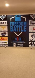 A large advertisement for the Freedom Battle event.