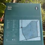 A map of a park is displayed on a sign.