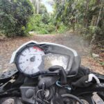 A motorcycle with a broken speedometer.
