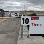 A sign on the side of a road that says "10 Tires."