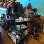 A store with a large display of plastic containers and bottles.
