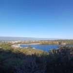 A beautiful view of a lake with mountains in the background.