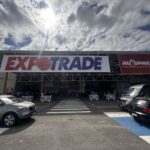 A large white sign with the words "Expo Trade" written on it.