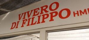 A red sign with the word "Filippo" written on it.