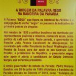 A yellow poster with a picture of a president and the words "A origem da palavra Negro na Bandera da Pariba" written on it.